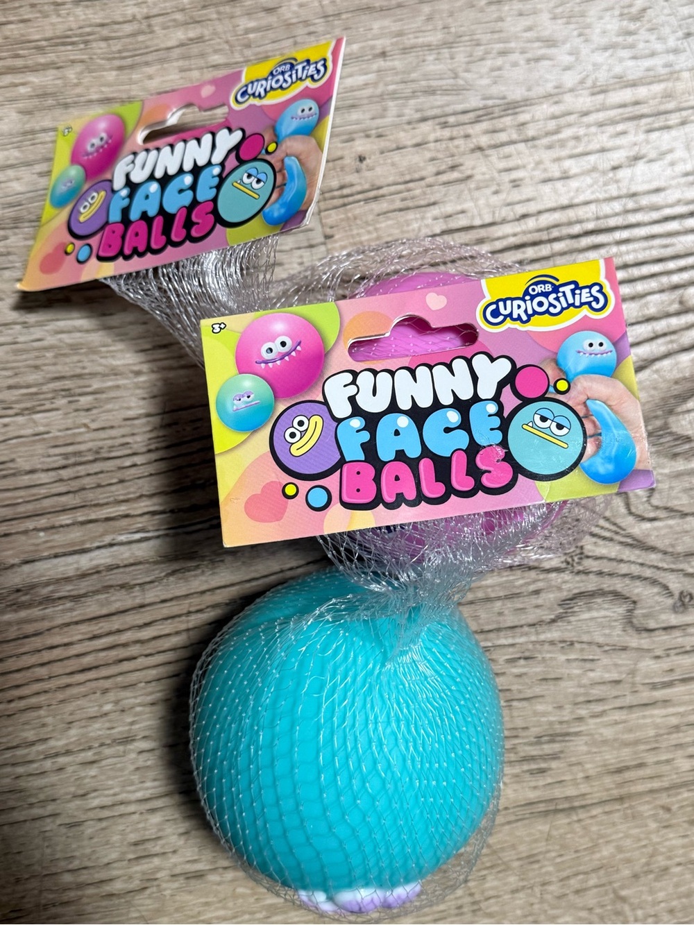 2 PACK of funny face ball squishys Pink & Blue Squeeze Fidget Toys